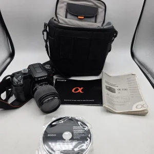 Sony Alpha A100 Digital SLR Camera With Bags and Manuals Parts Or Repair As-is